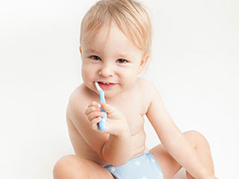 Baby brushing teeth