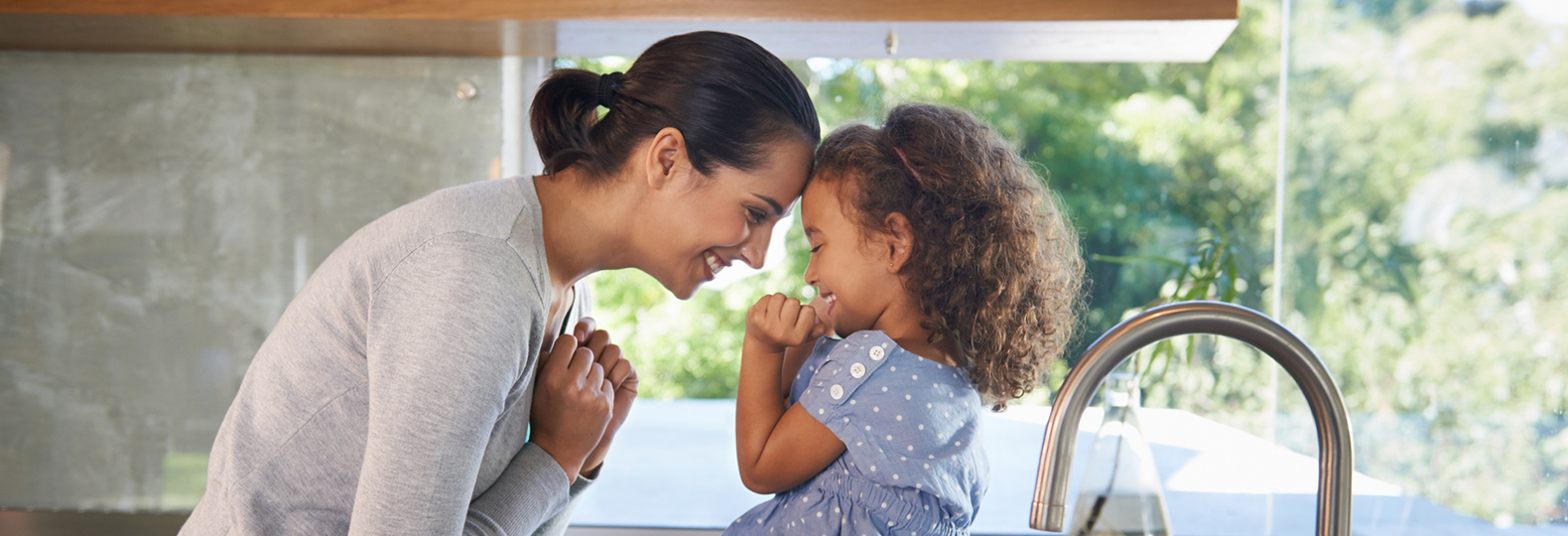 Parent and child laughing